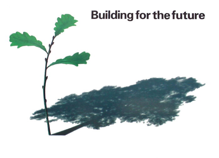 An oak sapling casts the shadow of a mighty oak with the words "Building for the future"